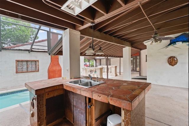 4420 Conway Gardens Rd, Orlando, FL 32806 - view of patio featuring ceiling fan, a sink, area for grilling, and a pool