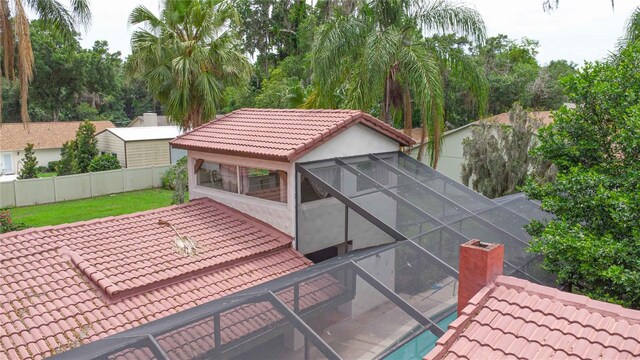 4420 Conway Gardens Rd, Orlando, FL 32806 - wooden deck featuring a patio and glass enclosure