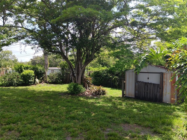 2103 Mantilla Ave, Orlando, FL 32811 - view of green lawn with a storage shed