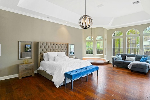 2357 Alaqua Dr, Longwood, FL 32779 - bedroom with a chandelier, dark wood finished floors, baseboards, and crown molding