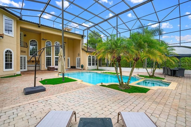 2357 Alaqua Dr, Longwood, FL 32779 - view of swimming pool featuring a patio area, french doors, a pool with connected hot tub, and glass enclosure