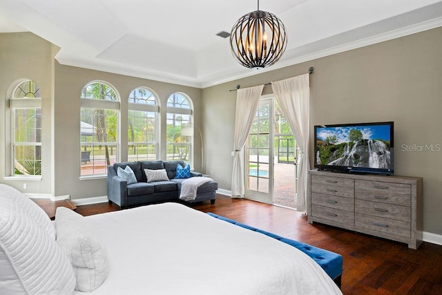 2357 Alaqua Dr, Longwood, FL 32779 - bedroom featuring access to exterior, a raised ceiling, dark wood finished floors, baseboards, and crown molding