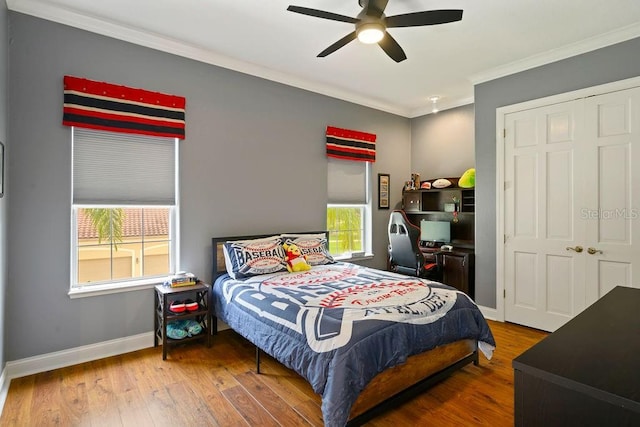 2357 Alaqua Dr, Longwood, FL 32779 - bedroom featuring wood finished floors, ornamental molding, baseboards, and ceiling fan