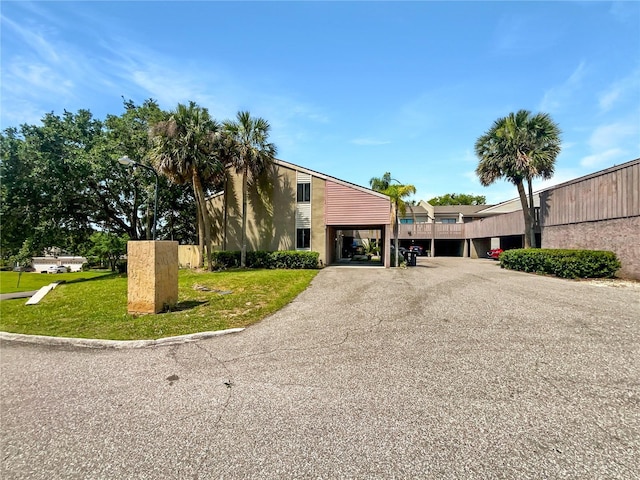 1404 Oak Pl Unit A, Apopka, FL 32712 - view of property with asphalt driveway