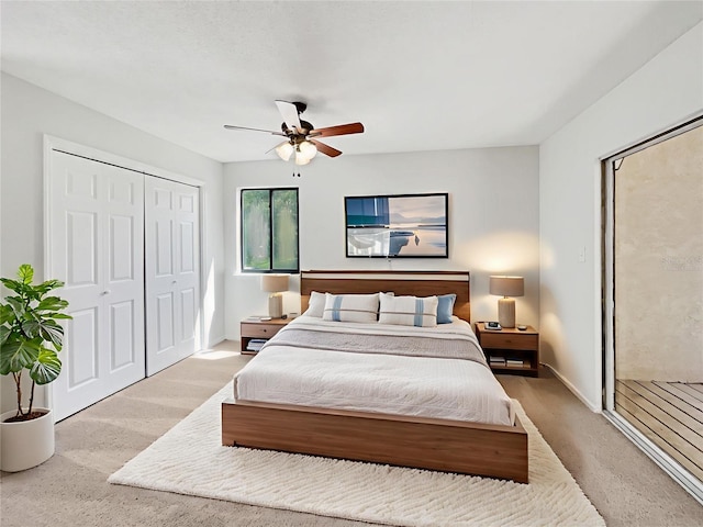 1404 Oak Pl Unit A, Apopka, FL 32712 - carpeted bedroom featuring ceiling fan, a closet, and baseboards