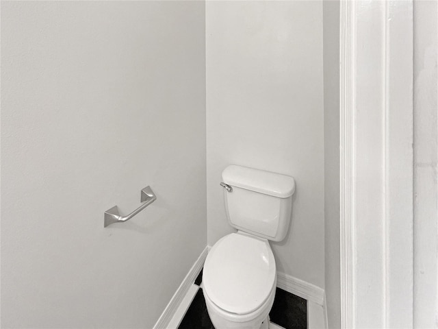 1404 Oak Pl Unit A, Apopka, FL 32712 - bathroom featuring toilet and baseboards