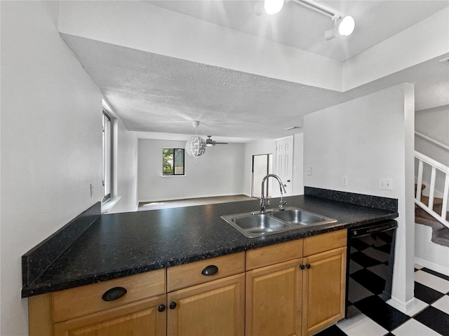 1404 Oak Pl Unit A, Apopka, FL 32712 - kitchen featuring a sink, dishwasher, tile patterned floors, a peninsula, and dark countertops