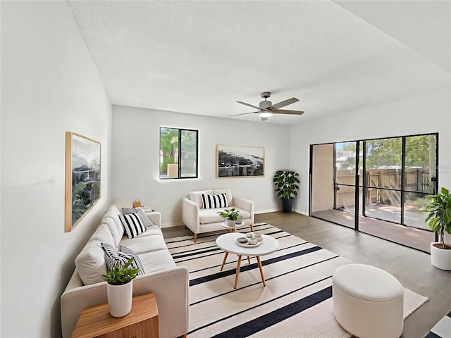 1404 Oak Pl Unit A, Apopka, FL 32712 - living room with a ceiling fan, wood finished floors, and baseboards