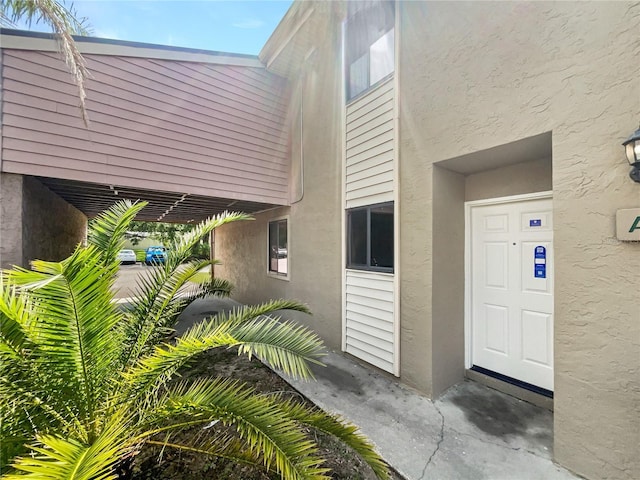 1404 Oak Pl Unit A, Apopka, FL 32712 - property entrance with stucco siding