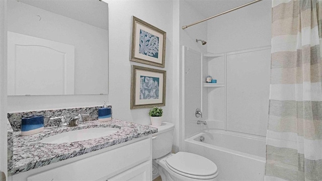 bathroom with shower / tub combo, toilet, and vanity