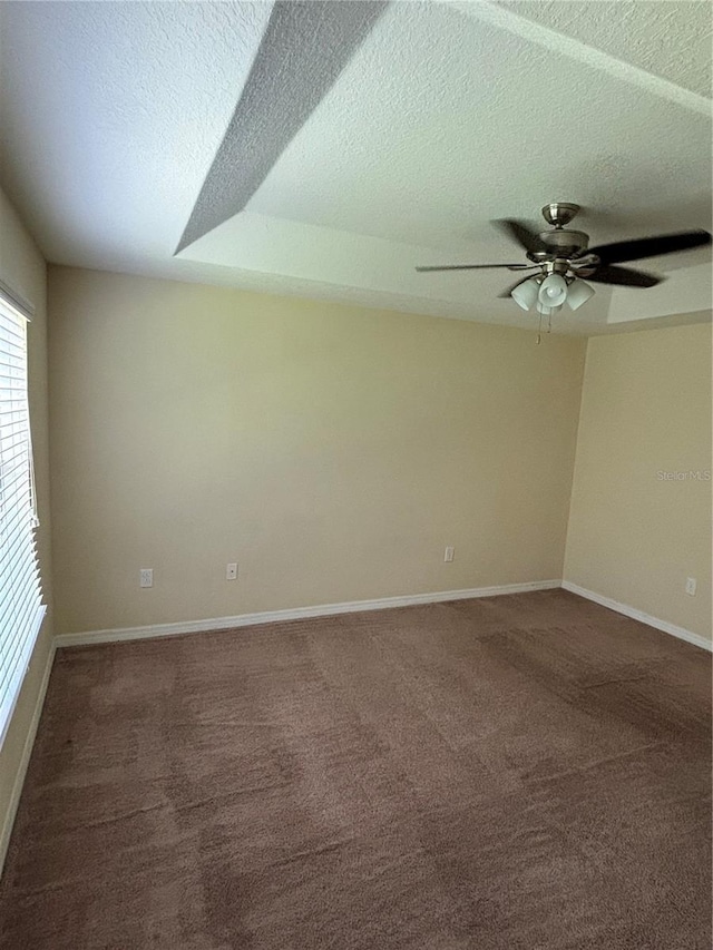 11187 Savannah Landing Cir, Orlando, FL 32832 - carpeted spare room featuring a ceiling fan, a textured ceiling, and baseboards