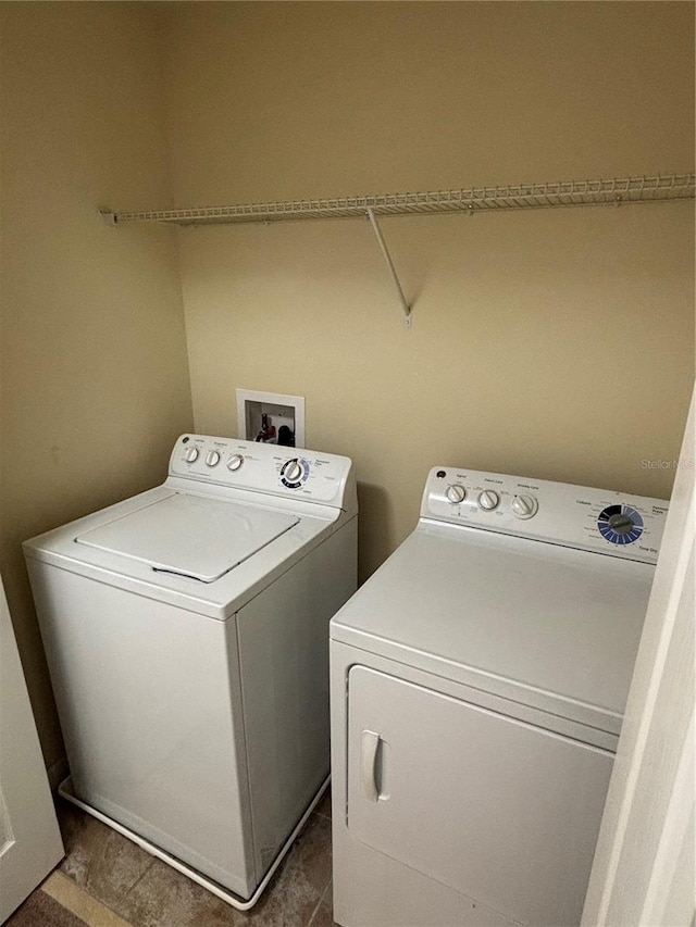 11187 Savannah Landing Cir, Orlando, FL 32832 - laundry area with washer and clothes dryer