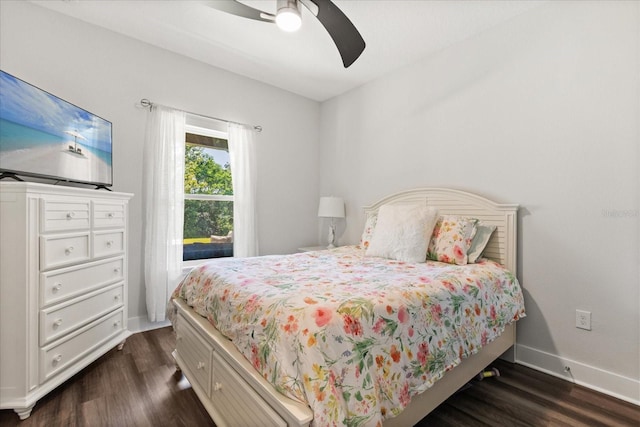 2340 Standing Rock Cir, Oakland, FL 34787 - bedroom featuring dark wood finished floors, baseboards, and ceiling fan
