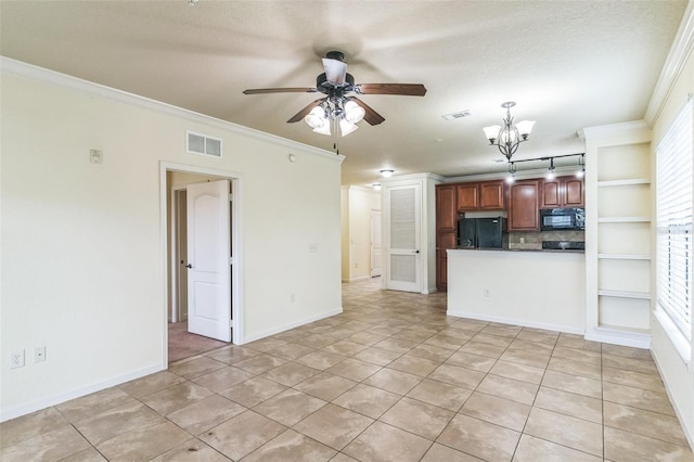 909 Charo Pkwy Unit 1011, Davenport, FL 33897 - unfurnished living room featuring crown molding, ceiling fan, plenty of natural light, light tile patterned floors, and a chandelier