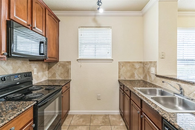 909 Charo Pkwy Unit 1011, Davenport, FL 33897 - kitchen featuring black appliances, a sink, tasteful backsplash, brown cabinets, and crown molding