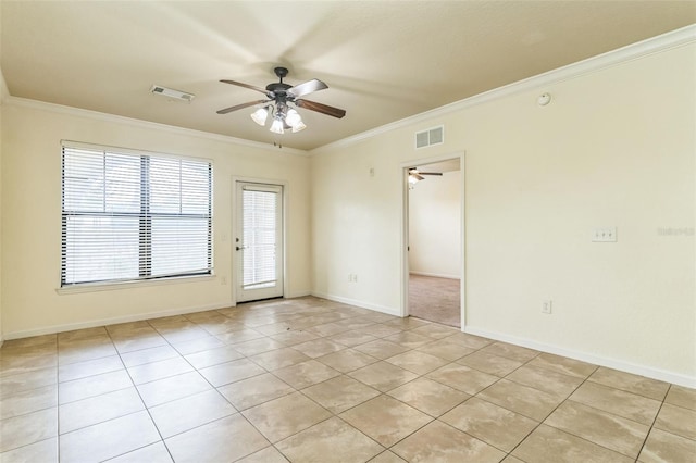 909 Charo Pkwy Unit 1011, Davenport, FL 33897 - spare room with a ceiling fan, light tile patterned flooring, crown molding, and baseboards