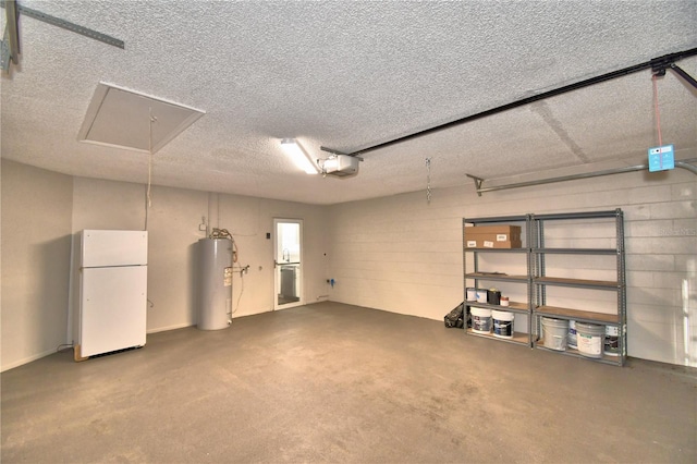 7504 Willow Wisp Dr E, Lakeland, FL 33810 - garage with freestanding refrigerator, water heater, and a garage door opener