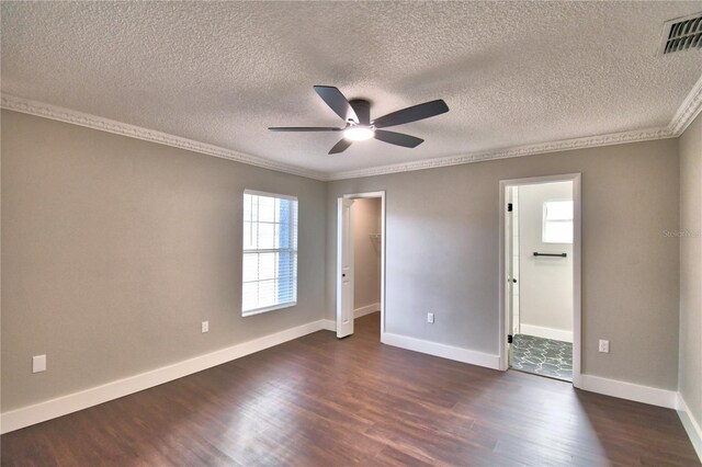 7504 Willow Wisp Dr E, Lakeland, FL 33810 - unfurnished room with dark wood finished floors, a ceiling fan, ornamental molding, baseboards, and a textured ceiling