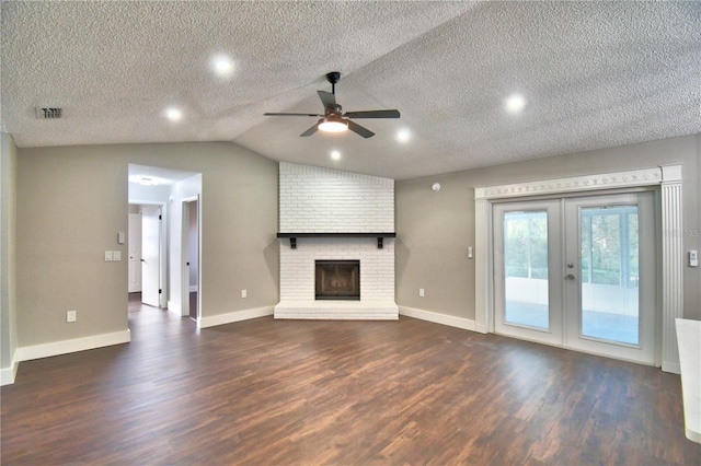 7504 Willow Wisp Dr E, Lakeland, FL 33810 - unfurnished living room featuring dark wood-style flooring, a ceiling fan, french doors, baseboards, and vaulted ceiling