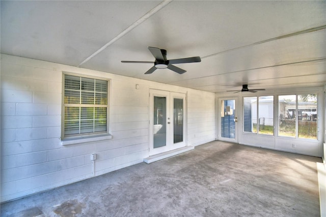 7504 Willow Wisp Dr E, Lakeland, FL 33810 - unfurnished sunroom featuring french doors