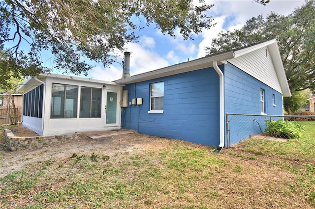 7504 Willow Wisp Dr E, Lakeland, FL 33810 - back of property featuring a sunroom