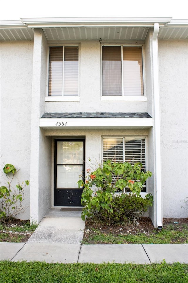 4364 White Pine Ave Unit 3, Orlando, FL 32811 - doorway to property with stucco siding