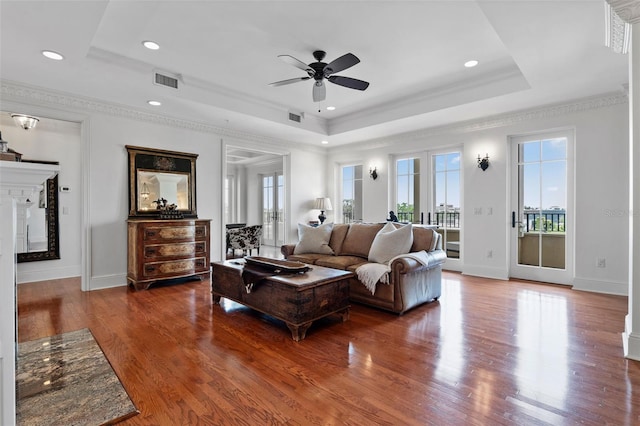 140 E Morse Blvd Unit J, Winter Park, FL 32789 - living area with a tray ceiling, a ceiling fan, wood finished floors, recessed lighting, and ornamental molding