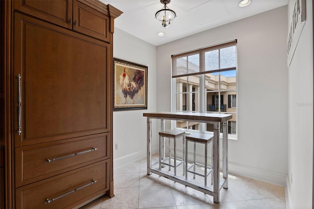 140 E Morse Blvd Unit J, Winter Park, FL 32789 - hallway with baseboards, light tile patterned floors, and recessed lighting