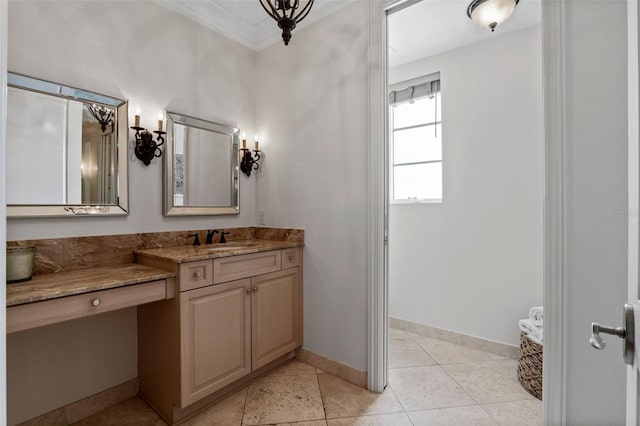 140 E Morse Blvd Unit J, Winter Park, FL 32789 - bathroom with vanity, ornamental molding, tile patterned flooring, and baseboards