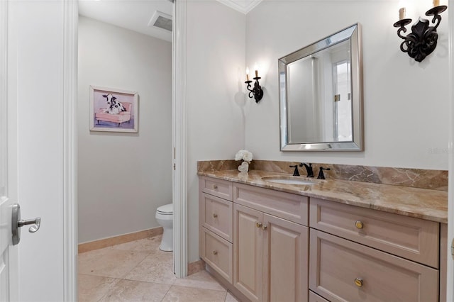 140 E Morse Blvd Unit J, Winter Park, FL 32789 - bathroom featuring toilet, vanity, baseboards, and tile patterned floors