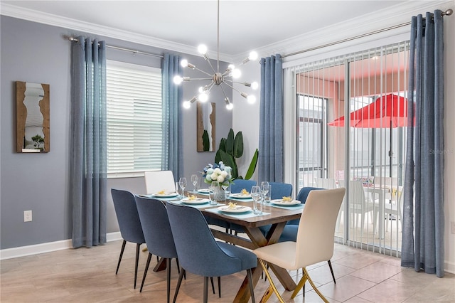 3004 Protagonist St, Kissimmee, FL 34746 - dining room featuring a chandelier, crown molding, and baseboards