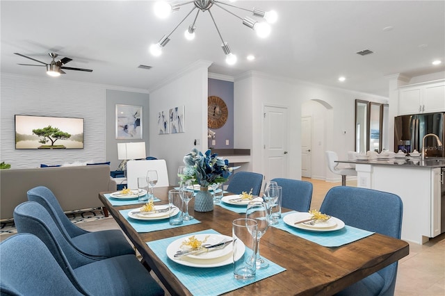 3004 Protagonist St, Kissimmee, FL 34746 - dining area featuring arched walkways, crown molding, a ceiling fan, and recessed lighting