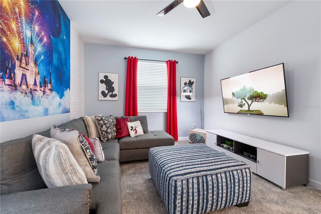 3004 Protagonist St, Kissimmee, FL 34746 - carpeted living room featuring ceiling fan and baseboards