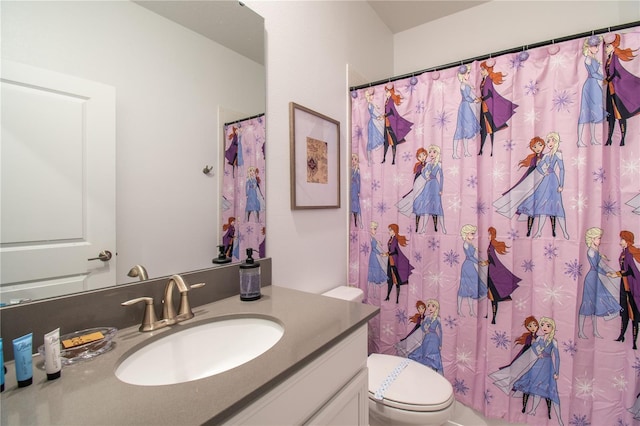 3004 Protagonist St, Kissimmee, FL 34746 - bathroom with vanity, toilet, and a shower with curtain