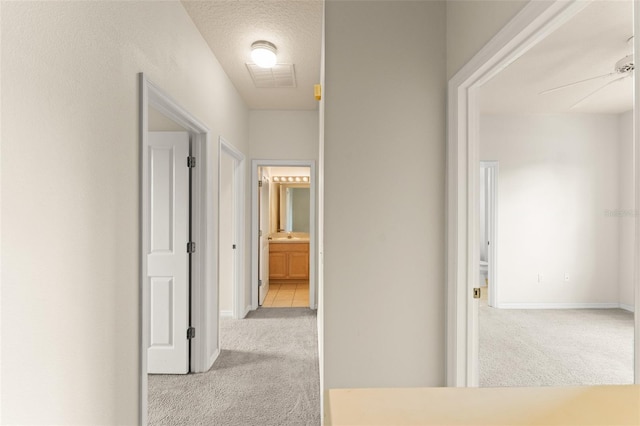 214 Monroe Cir, Davenport, FL 33896 - hallway featuring carpet floors and baseboards