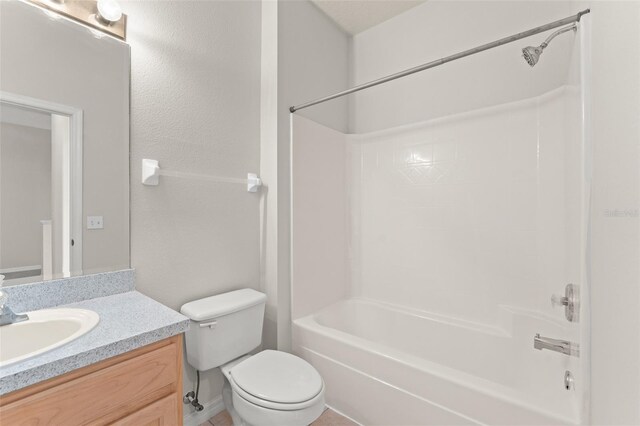 214 Monroe Cir, Davenport, FL 33896 - bathroom with vanity, shower / bath combination, and toilet