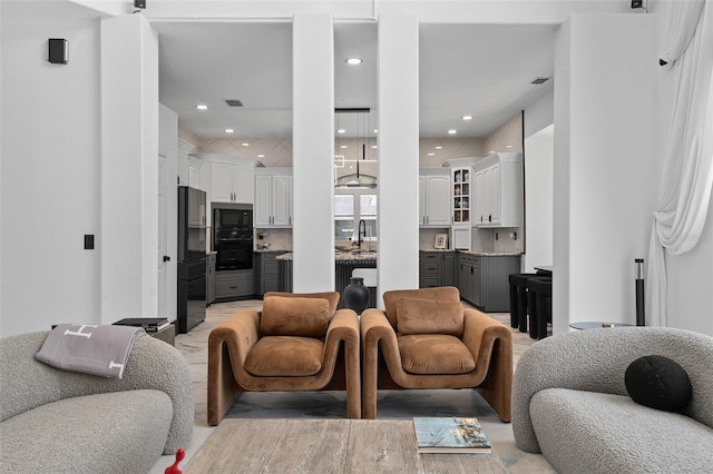 8131 Vineland Oaks Blvd, Orlando, FL 32835 - living room featuring recessed lighting