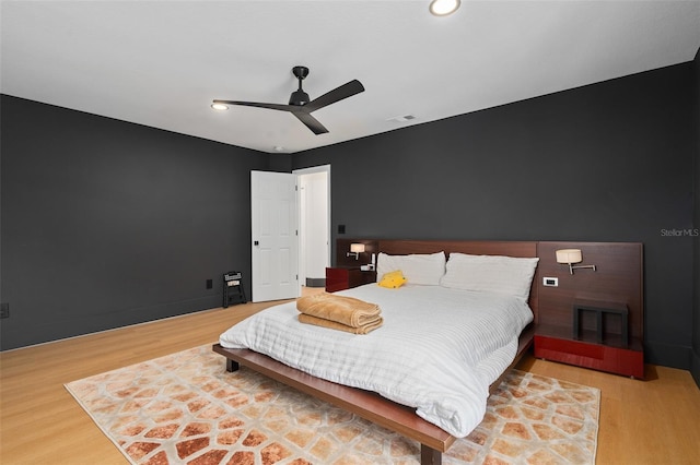 8131 Vineland Oaks Blvd, Orlando, FL 32835 - bedroom with light wood-style flooring and ceiling fan