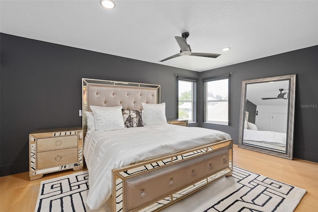 8131 Vineland Oaks Blvd, Orlando, FL 32835 - bedroom featuring wood finished floors, recessed lighting, and ceiling fan