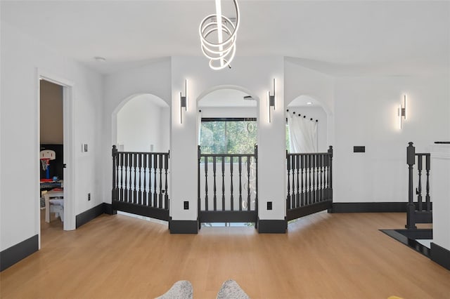 8131 Vineland Oaks Blvd, Orlando, FL 32835 - unfurnished living room with wood finished floors and baseboards