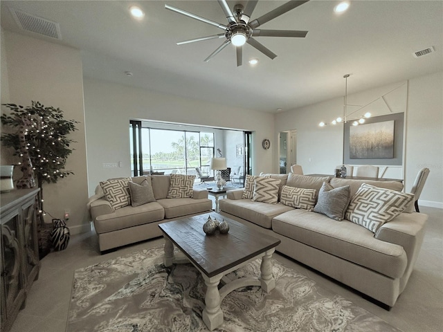 410 SE Vallarta Dr, Port St Lucie, FL 34984 - living area featuring recessed lighting, ceiling fan, a chandelier, and baseboards