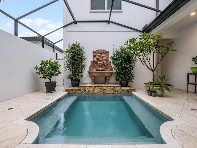 8818 Bismarck Palm Dr, Winter Garden, FL 34787 - swimming pool with a patio area and glass enclosure