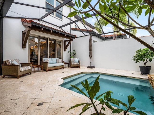 8818 Bismarck Palm Dr, Winter Garden, FL 34787 - outdoor pool featuring a patio, an outdoor hangout area, and a lanai