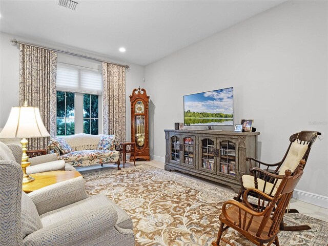 8818 Bismarck Palm Dr, Winter Garden, FL 34787 - living room with baseboards and recessed lighting