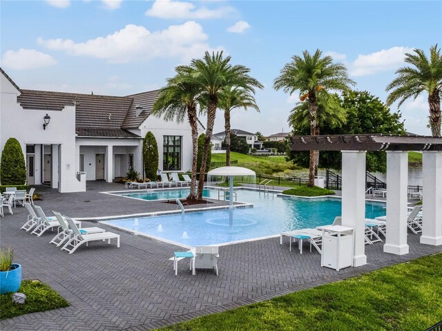 8818 Bismarck Palm Dr, Winter Garden, FL 34787 - community pool with a pergola and a patio