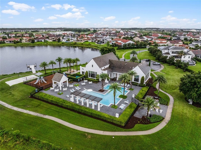 8818 Bismarck Palm Dr, Winter Garden, FL 34787 - aerial view of residential area with a pool area and a nearby body of water