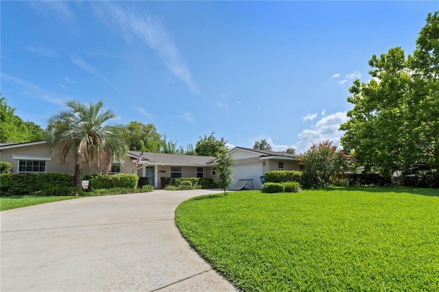 1770 Chinook Trl, Maitland, FL 32751 - single story home featuring a front yard, concrete driveway, an attached garage, and stucco siding