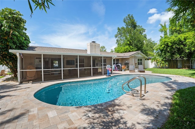1770 Chinook Trl, Maitland, FL 32751 - view of swimming pool with a sunroom and a patio area