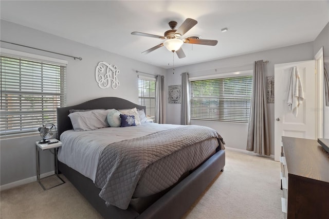 1770 Chinook Trl, Maitland, FL 32751 - bedroom featuring light carpet, baseboards, and a ceiling fan