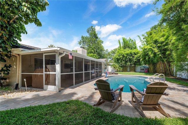 1770 Chinook Trl, Maitland, FL 32751 - view of pool featuring a sunroom, a patio, and a fenced backyard